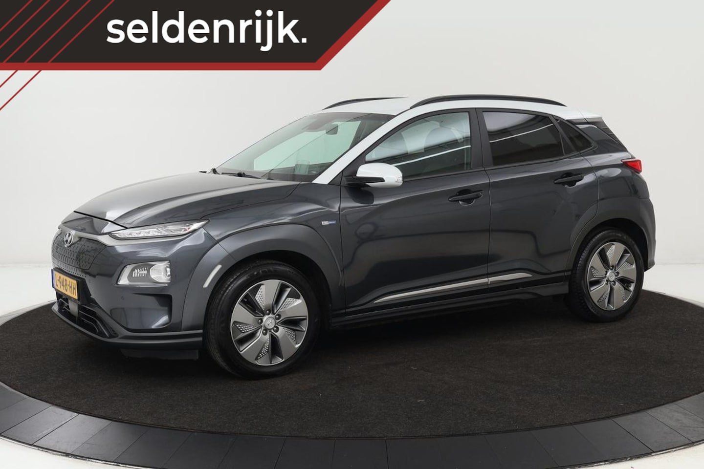 Hyundai Kona Electric - EV Fashion 64 kWh | Trekhaak | Leder | | Subsidie | Stoelverwarming | Adaptive cruise | He - AutoWereld.nl