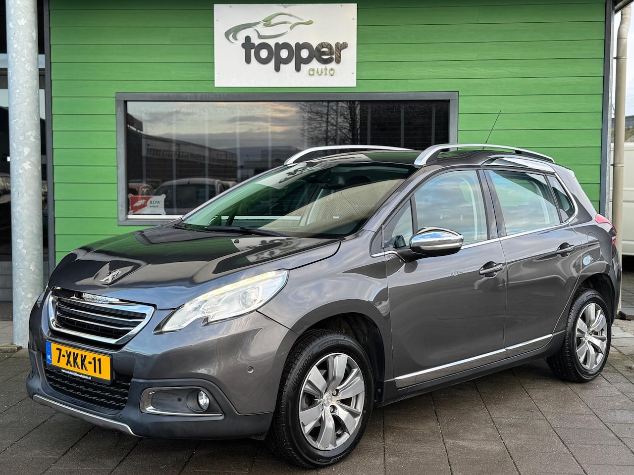 Peugeot 2008 - 1.2 VTi Allure Pack Premium Plus / Navi / Cruise / - AutoWereld.nl