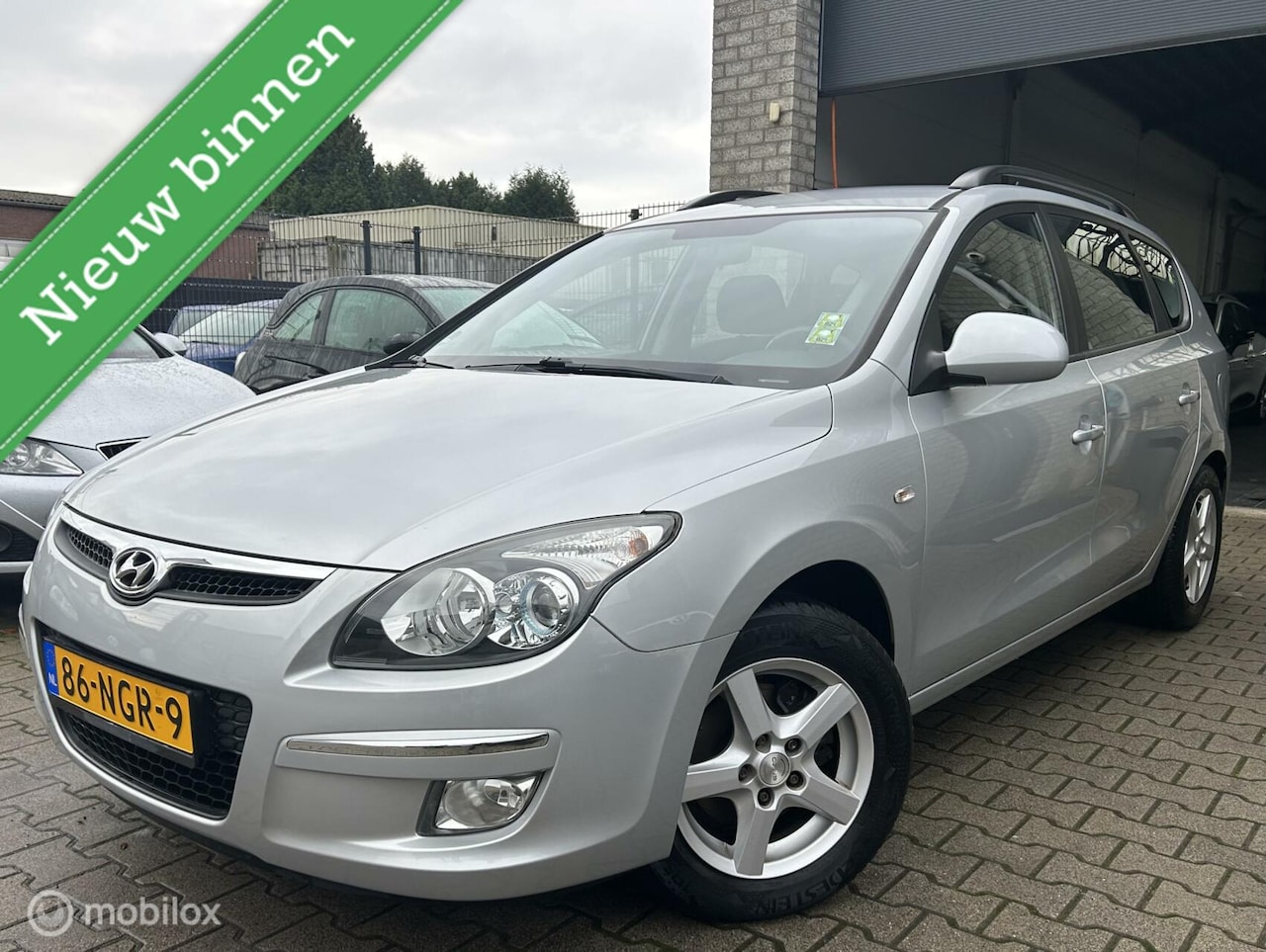 Hyundai i30 CW - 1.4i i-Motion / Airco / Sport.V / N.A.P - AutoWereld.nl