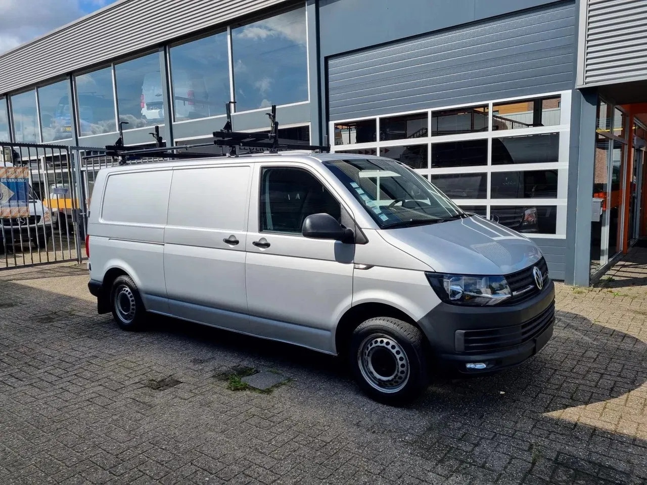 Volkswagen Transporter - 2.0 TDI L2H1 84 KW SORTIMO / ROOFLIFT EURO 6 - AutoWereld.nl