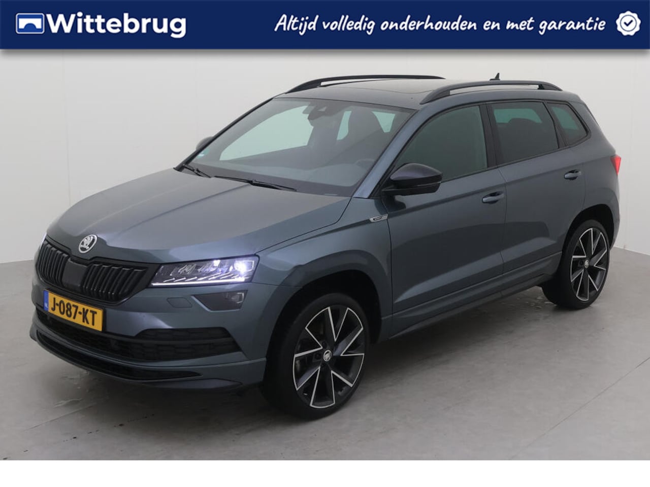 Skoda Karoq - 1.5 TSI ACT 150pk Sportline Business DSG AUTOMAAT Panorama dak / Navigatie / LM 19 inch / - AutoWereld.nl