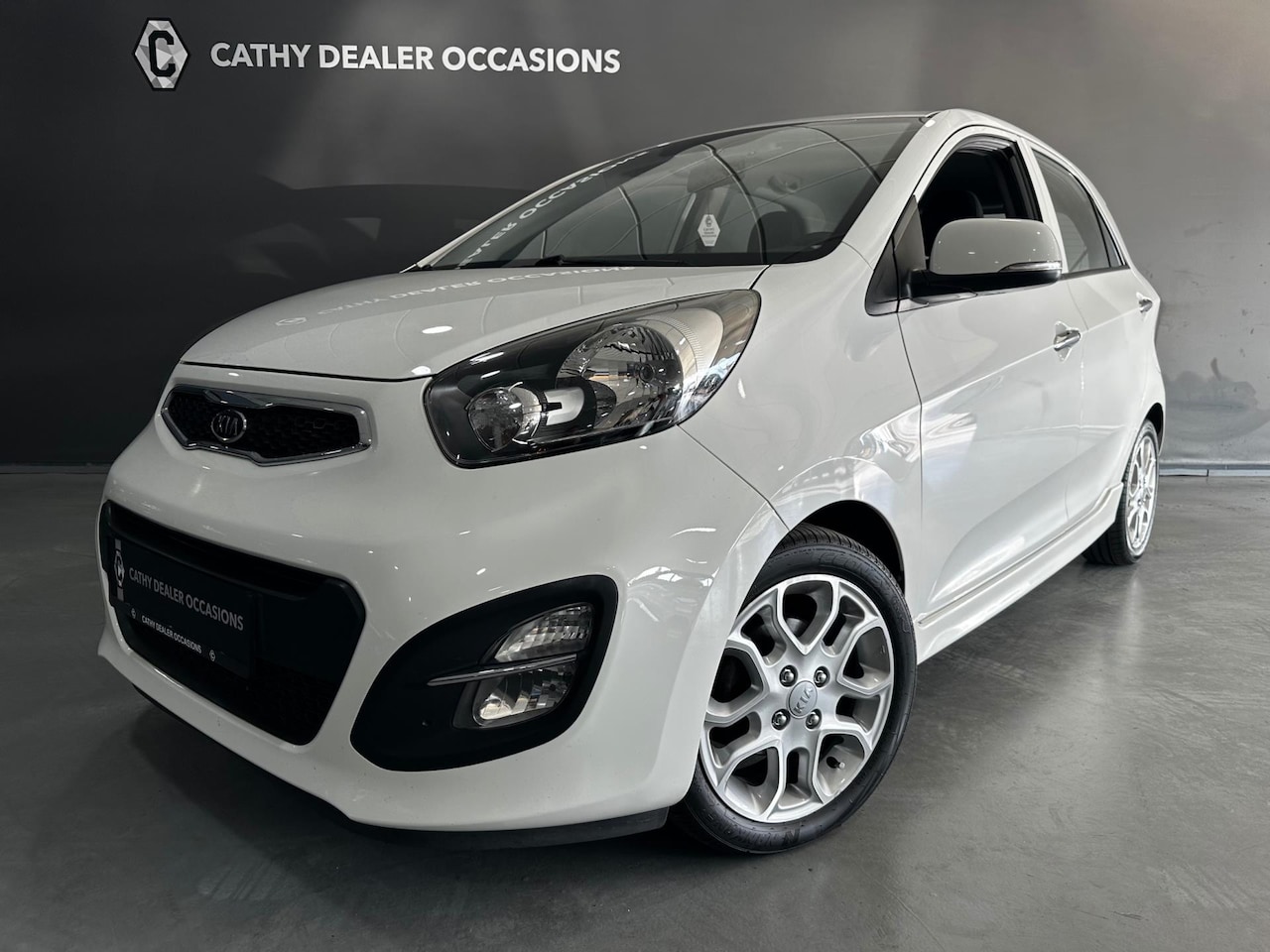 Kia Picanto - 1.2 CVVT Super Pack Climate Stoelverwarming NAV 15" LMV - AutoWereld.nl