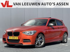 BMW 1-serie - M135i High Executive | Valencia Orange | Volle auto