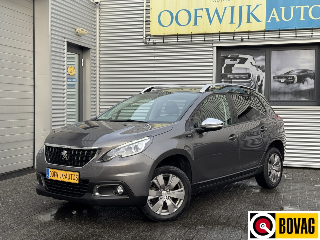 Peugeot 2008 - 1.2 PureTech Style Clima Navi Led CarPlay - AutoWereld.nl