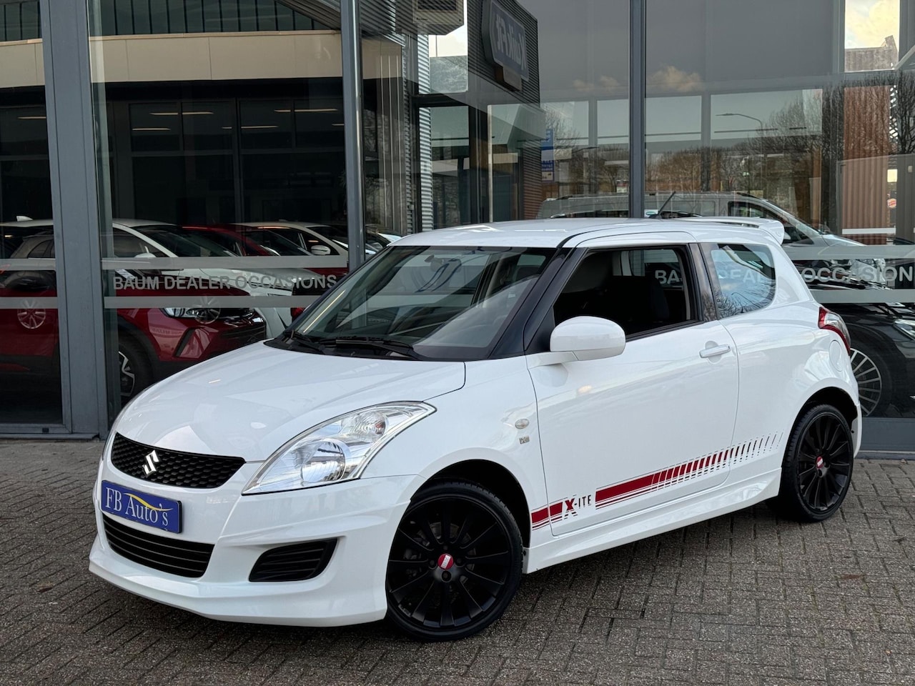 Suzuki Swift - 1.2 X-ite Airco Lmv - AutoWereld.nl