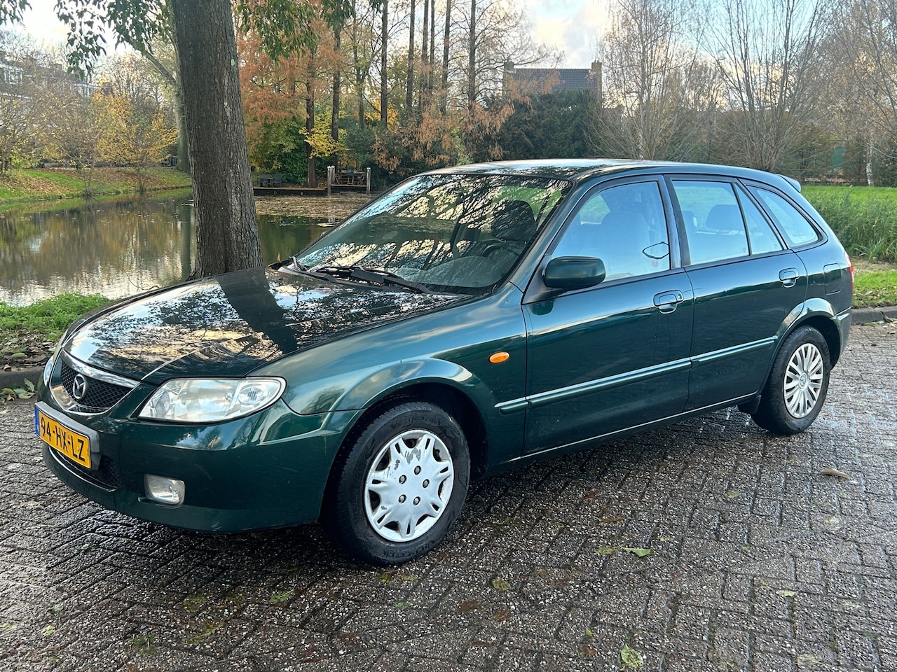 Mazda 323 Fastbreak - 1.6i Touring 2002 airco! trekhaak! goed rijdend! ruime auto! - AutoWereld.nl