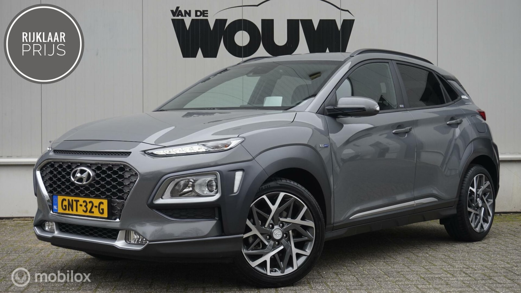 Hyundai Kona - 1.6 GDI HEV Navigatie | HUD | 18 inch | Achteruitrijcamera | Blind Spot Warning - AutoWereld.nl