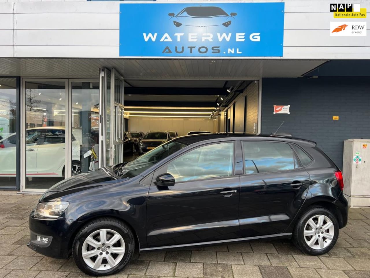 Volkswagen Polo - 1.2 TSI Highline Navi/Camera/Clima/LM velgen - AutoWereld.nl