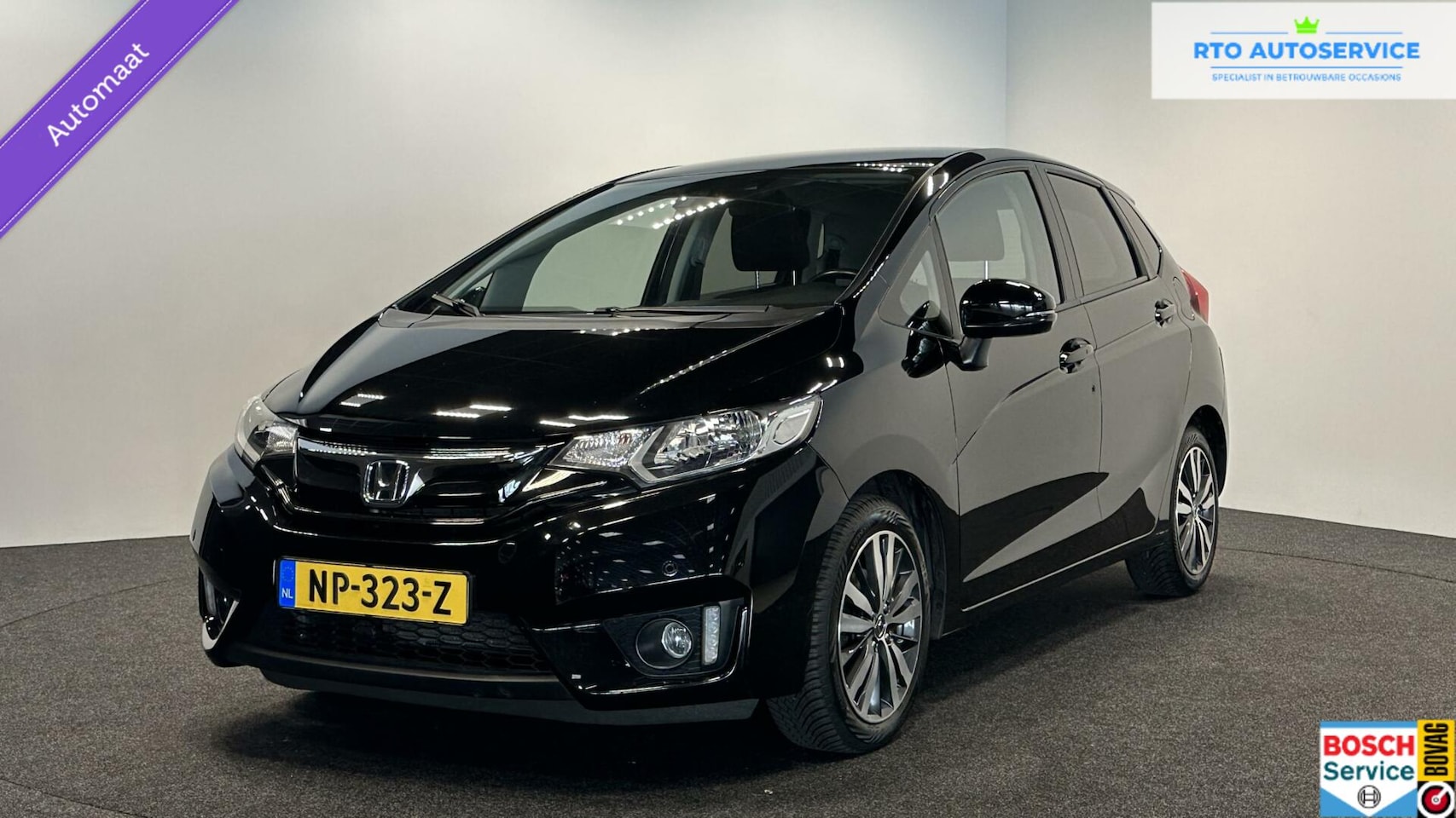 Honda Jazz - 1.3 i-VTEC AUTOMAAT AIRCO CRUISE NAVI 79.143 km NAP - AutoWereld.nl