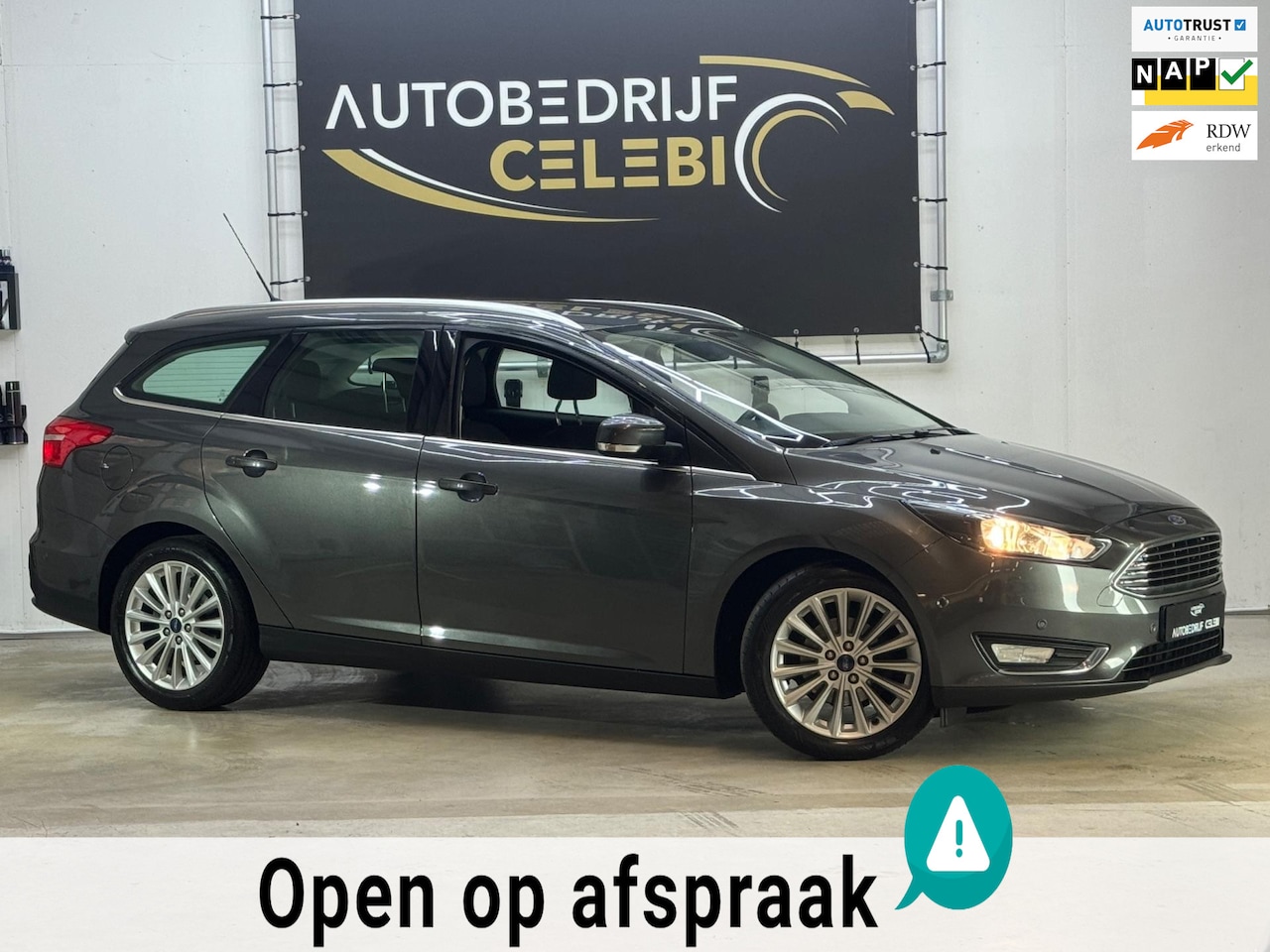 Ford Focus Wagon - 1.0 Titanium Edition 2015 GRIJS CLIMA|NAVI - AutoWereld.nl