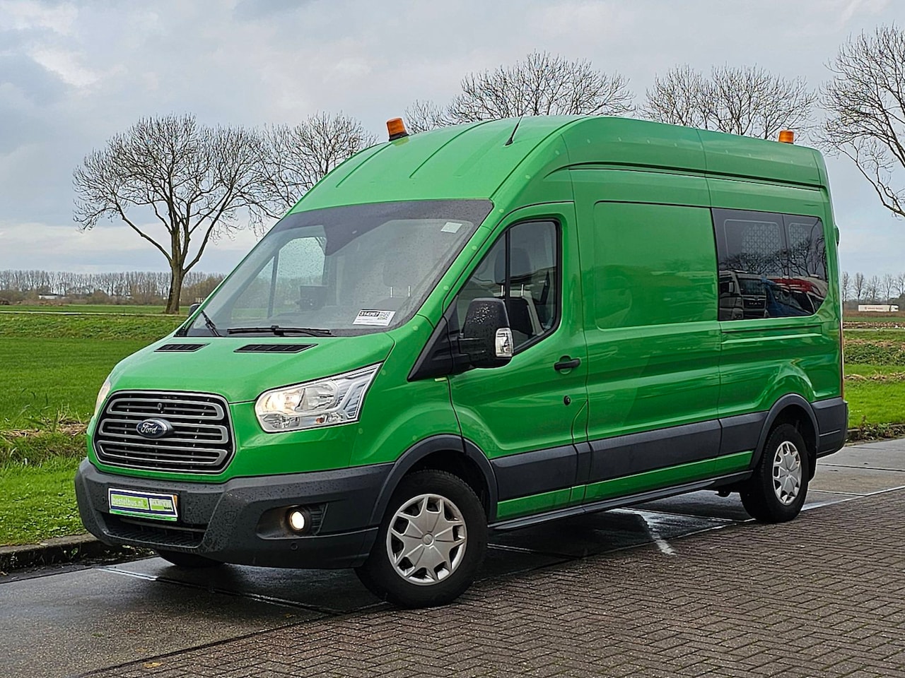 Ford Transit - 350 2.0 TDCI L2H3 Trend airco, navi, pdc, trekhaak - AutoWereld.nl