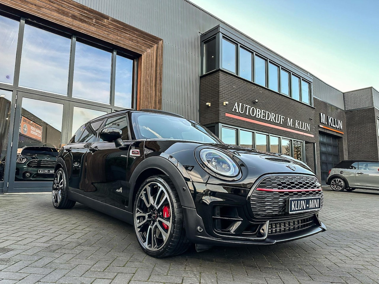 MINI Clubman - Mini 2.0 JCW ALL4 John Cooper Works F1 aut 306pk/pano/camera/hk/head up/np:73.000,- - AutoWereld.nl