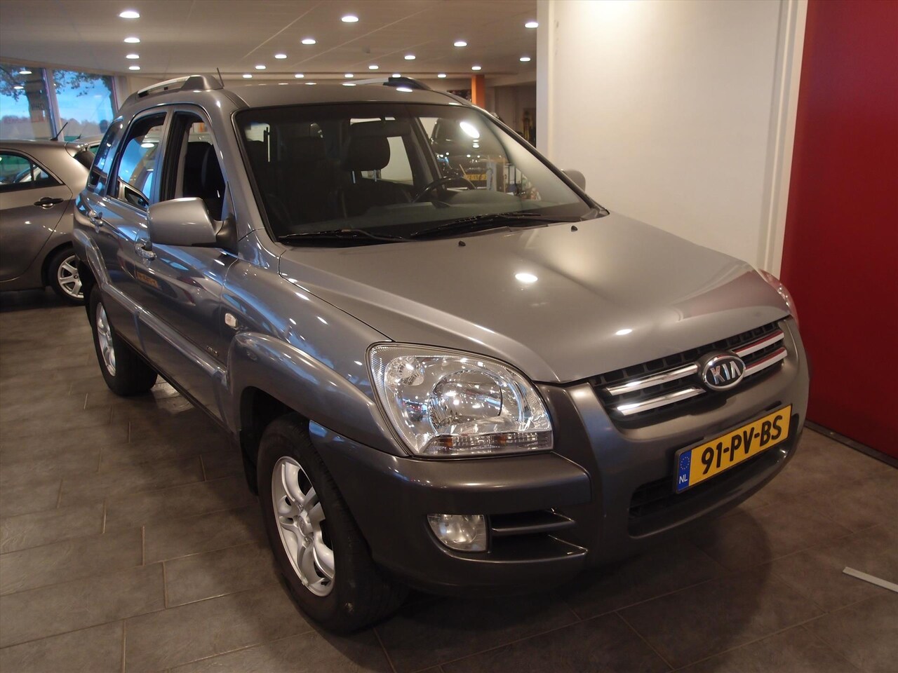 Kia Sportage - 2.0i 4WD Adventure Clima 1e Eign Dealer Auto - AutoWereld.nl