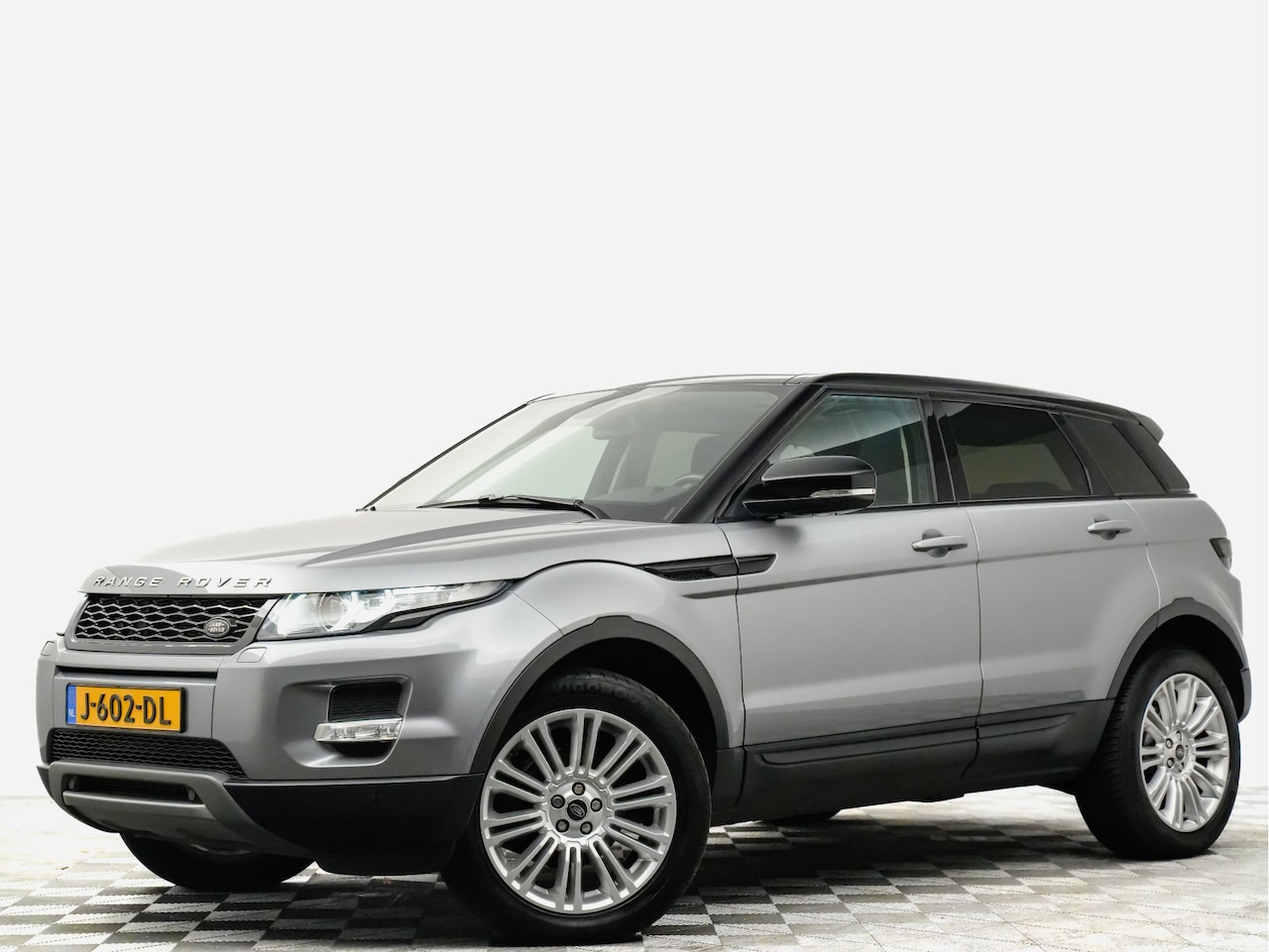 Land Rover Range Rover Evoque - 2.0 Si Aut 245pk 4WD Prestige (panodak,leer,xenon,navi,camera) - AutoWereld.nl