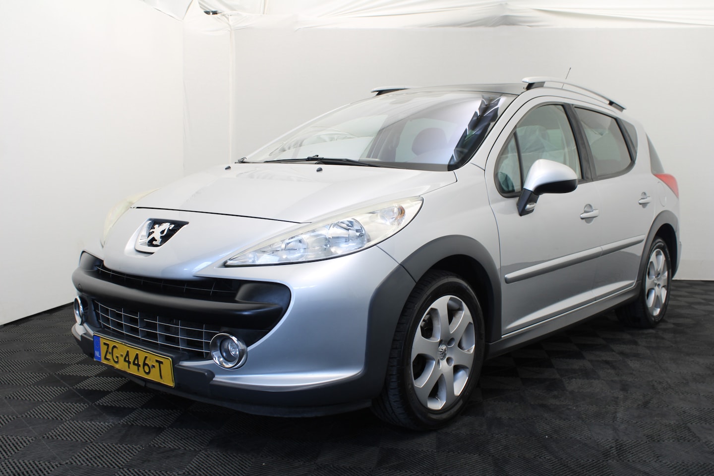 Peugeot 207 SW Outdoor - 1.6 VTi Sublime Storing ? - AutoWereld.nl