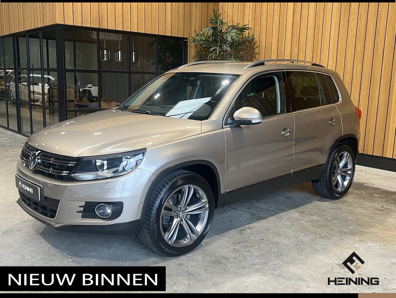 Volkswagen Tiguan - 1.4 TSI Sport&Style Navi, Trekhaak 1800 kg, 19 inch. - AutoWereld.nl