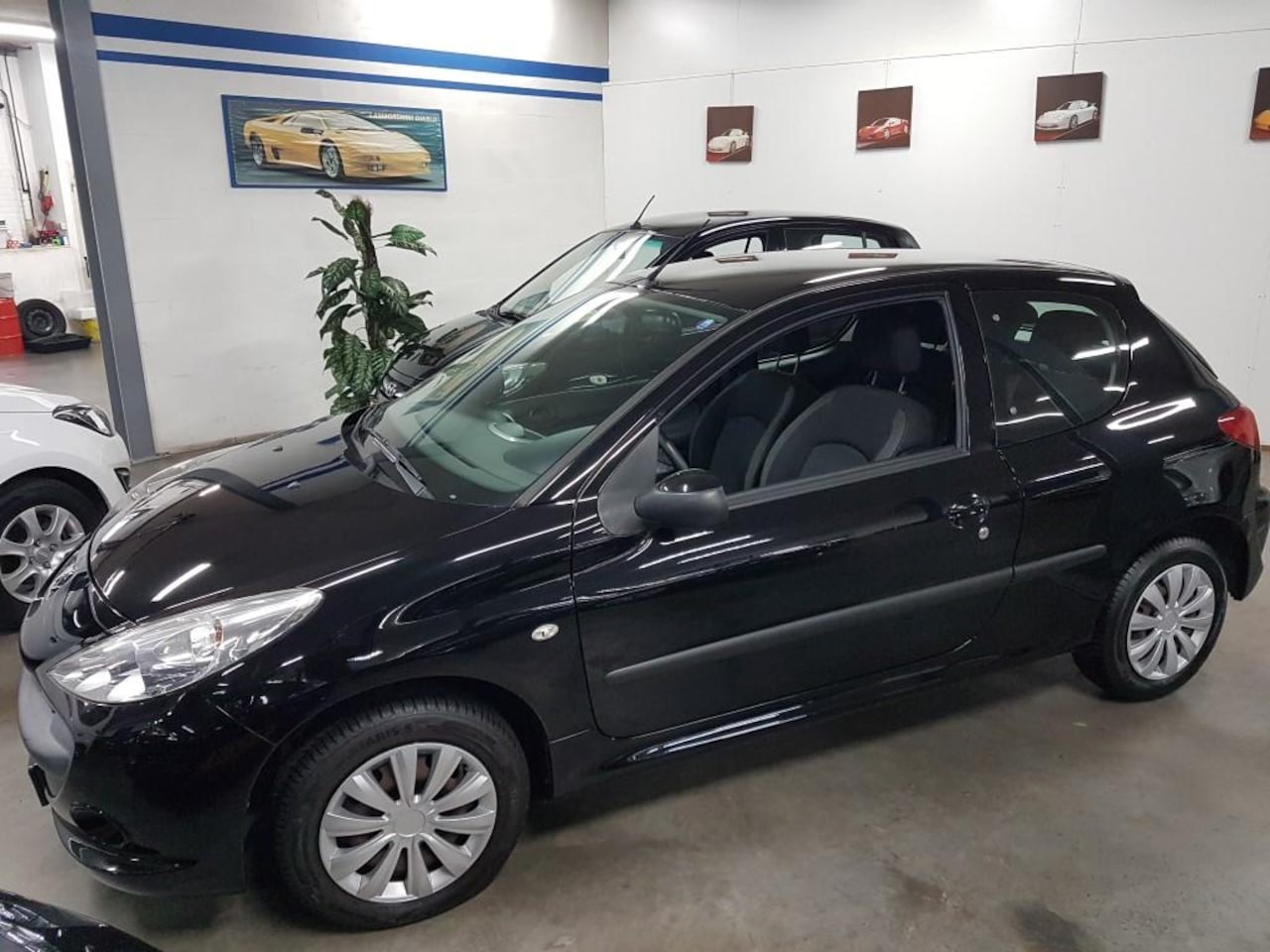 Peugeot 206 - 1100i 3 DEURS AIRCO - AutoWereld.nl