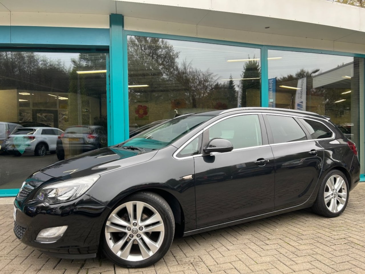 Opel Astra Sports Tourer - Sports Tourer 1.6 TURBO 140pk SPORT Climate, Cruise, 18Inch, PDC - AutoWereld.nl