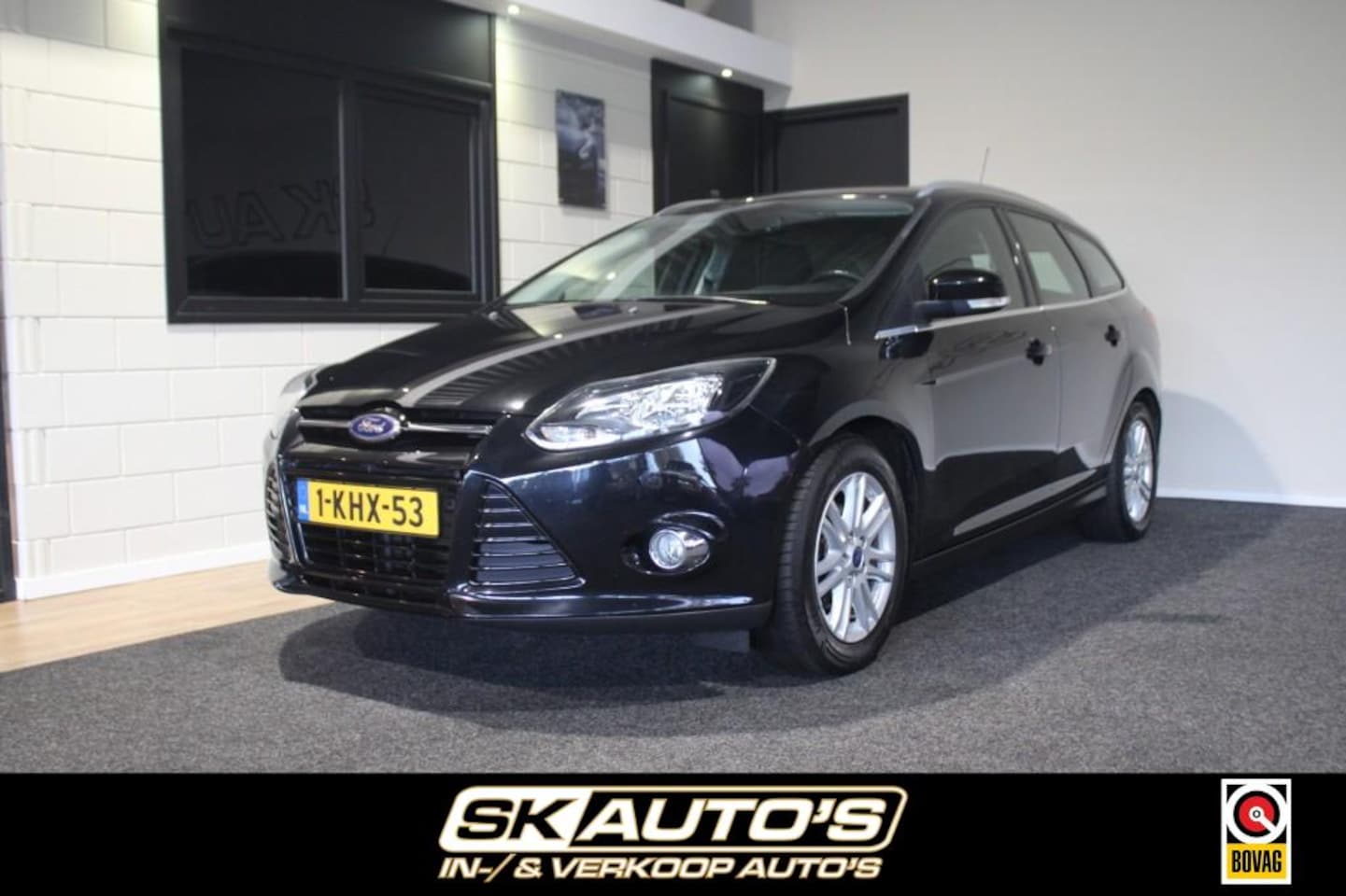 Ford Focus - 1.0 ECOB. TITANIUM NAP! TREKHAAK CRUISE PDC CLIMA NAVI ALL-IN PR - AutoWereld.nl