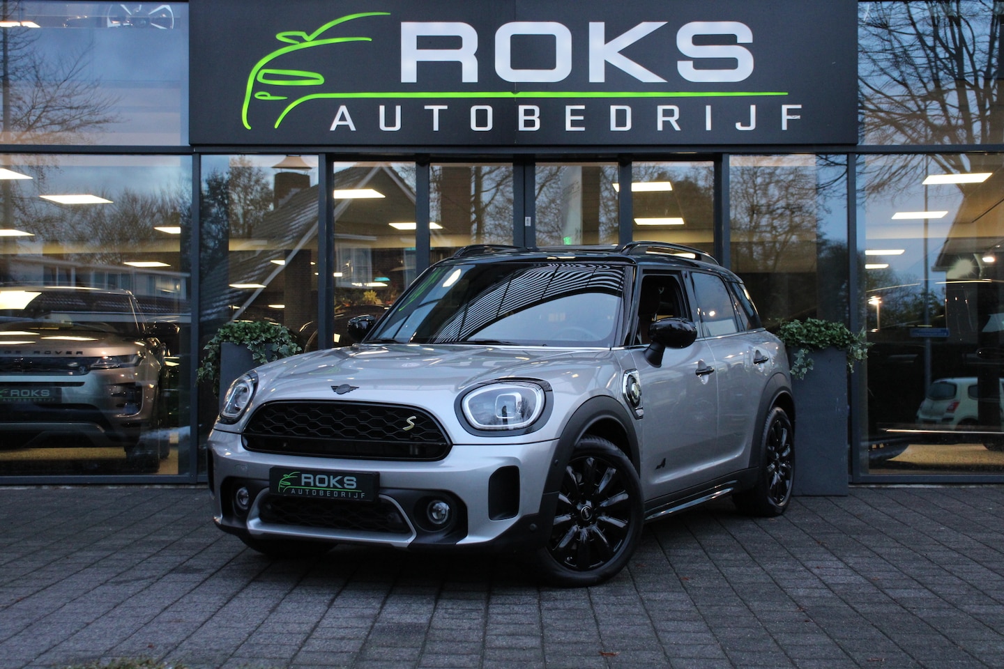 MINI Countryman - Mini 2.0 Cooper S E ALL4 Black Optic Navi/Camera/Keyless/Memory/Sfeerverlichting/Harman Ka - AutoWereld.nl