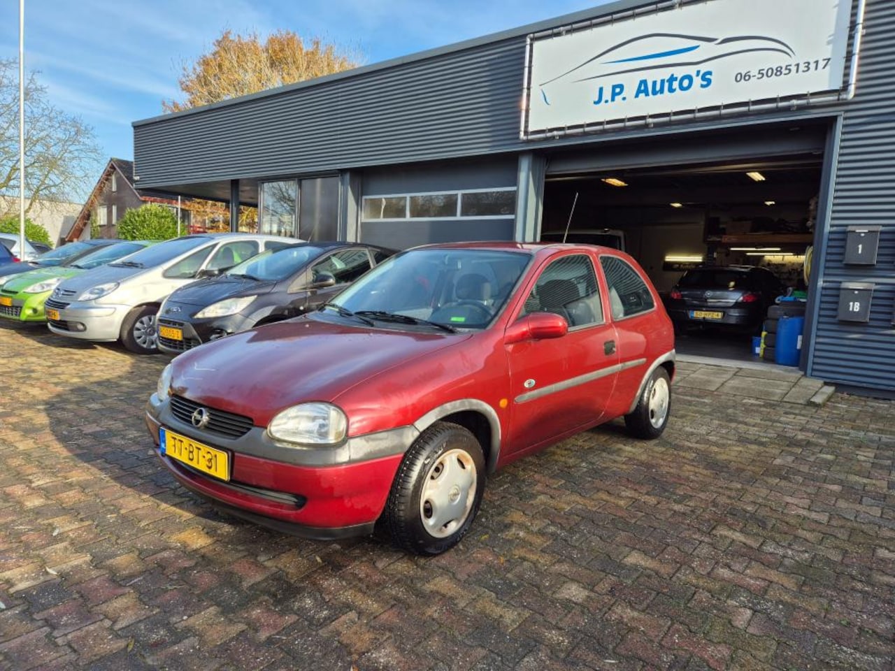 Opel Corsa - 1.4i Strada lange apk - AutoWereld.nl