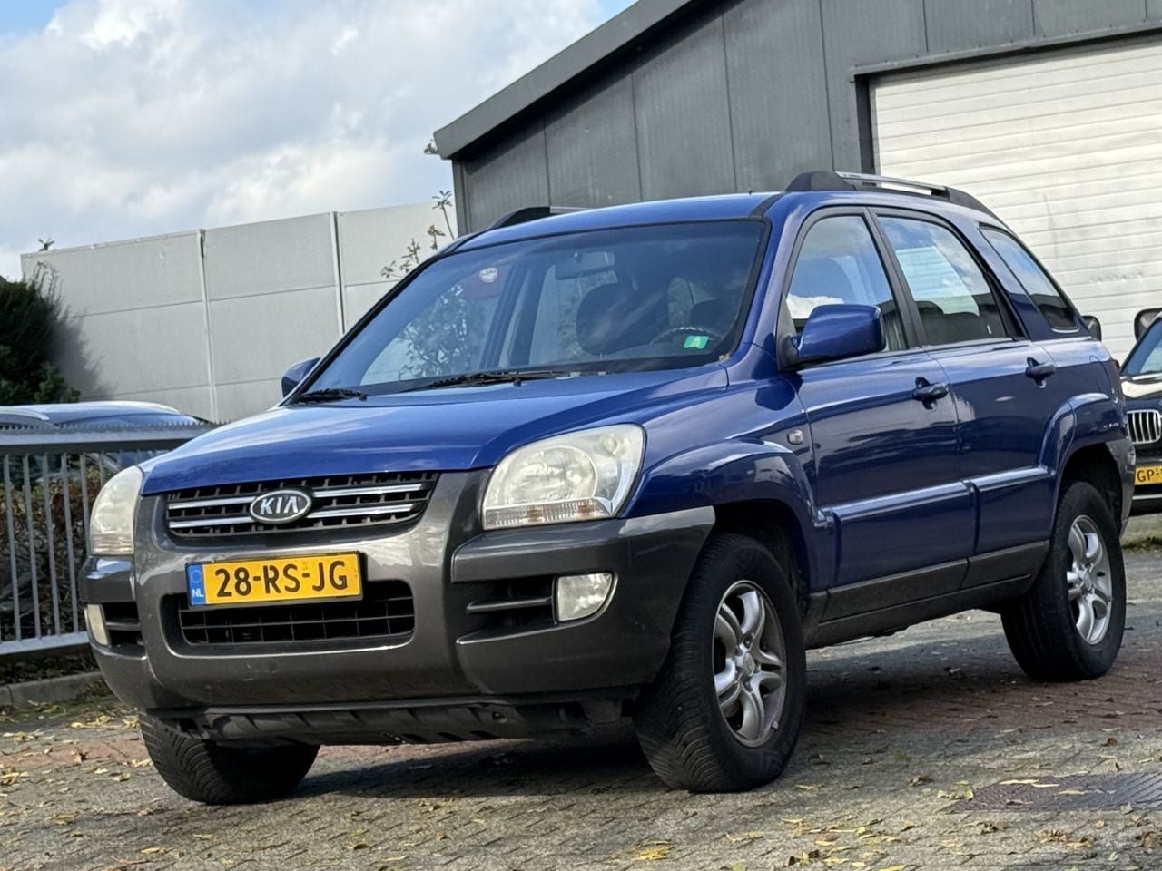 Kia Sportage - 2.0 CVVT Comfort 2.0 CVVT Comfort - AutoWereld.nl