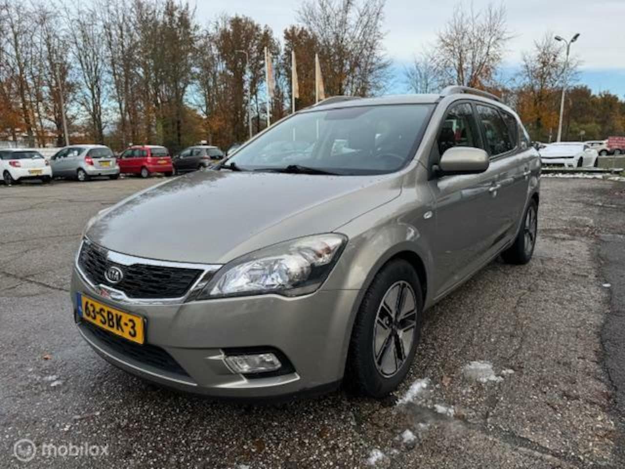 Kia Cee'd Sporty Wagon - 1.4 CVVT X-ecutive Navigatie+Trekhaak - AutoWereld.nl