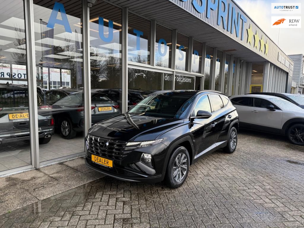 Hyundai Tucson - 1.6 T-GDI MHEV Comfort Smart 150PK / NAVIGATIE / ACHTERUITRIJCAMERA - AutoWereld.nl