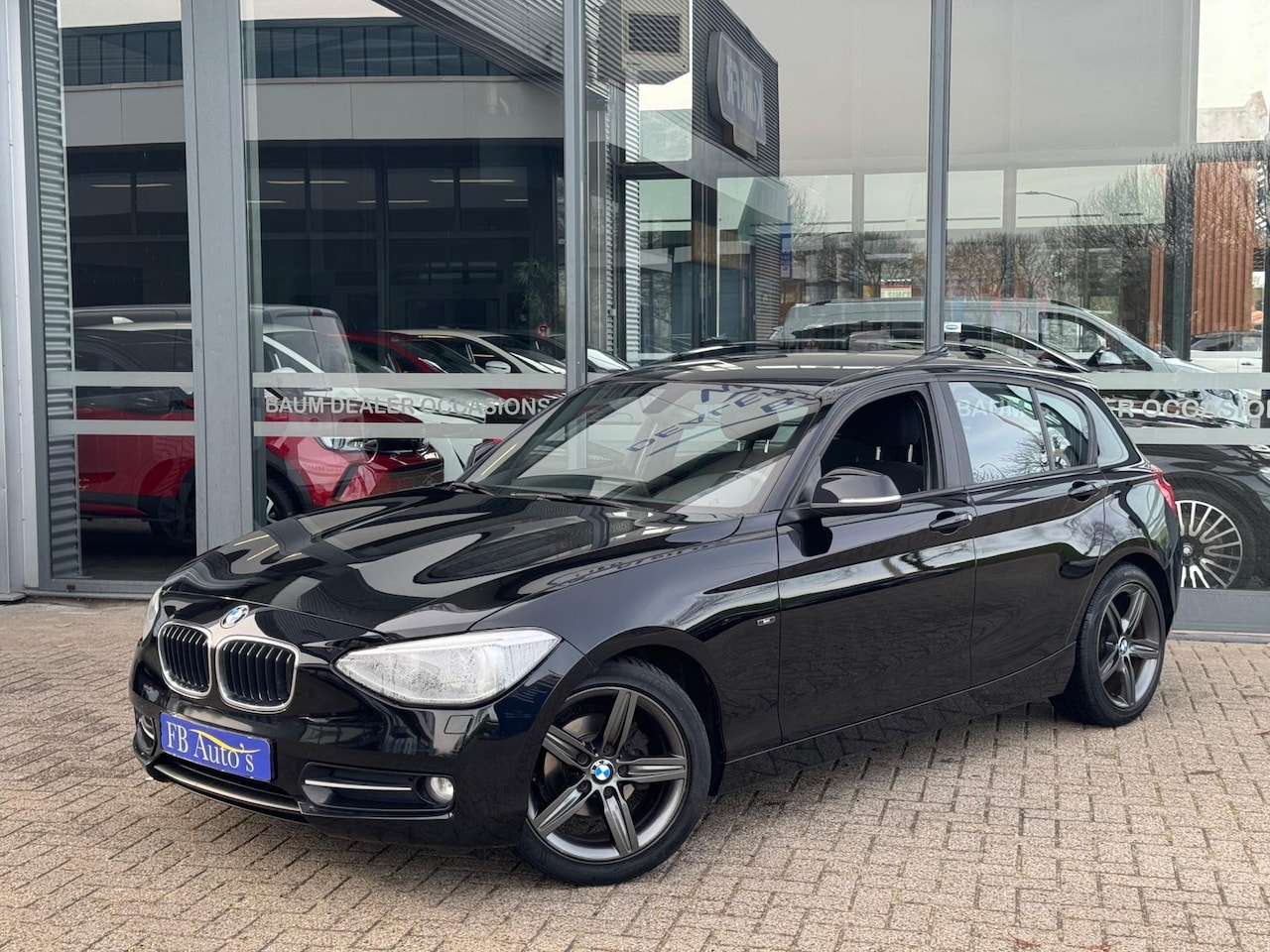 BMW 1-serie - 114i EDE Business+ Airco Lmv Cruise - AutoWereld.nl