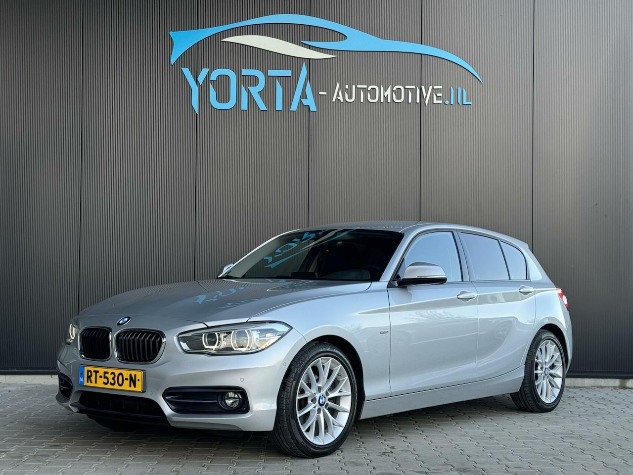 BMW 1-serie - 118i Sport Line AUTOMAAT*CAMERA*LEDER*NL AUTO - AutoWereld.nl