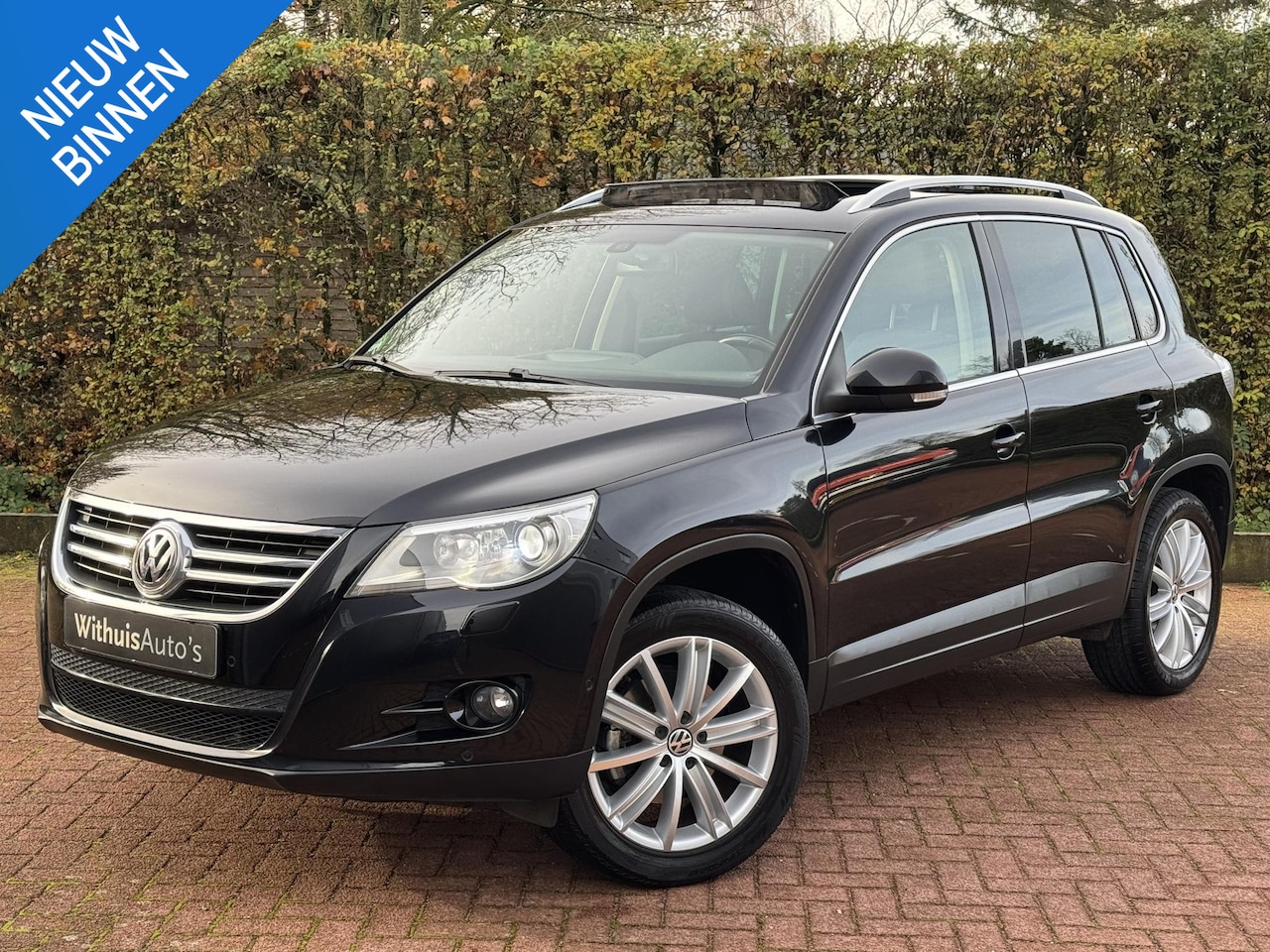 Volkswagen Tiguan - 1.4 TSI 150pk Sport Panoramadak Trekhaak  Xenon - AutoWereld.nl