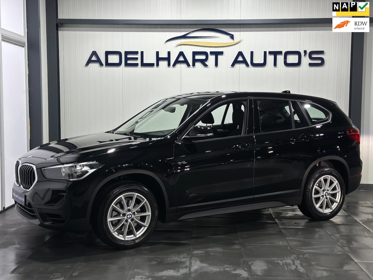 BMW X1 - SDrive18i Executive / Navigatie full map / Elektrische koffer / Cruise control / Climate c - AutoWereld.nl