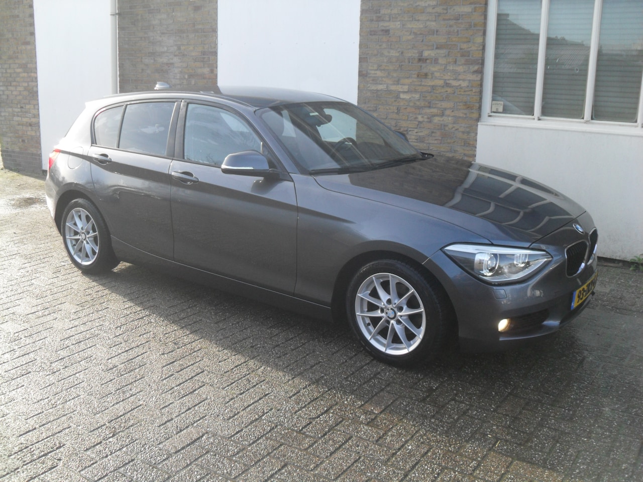 BMW 1-serie - 116i EDE Business+ leer airco navi 6 vers - AutoWereld.nl