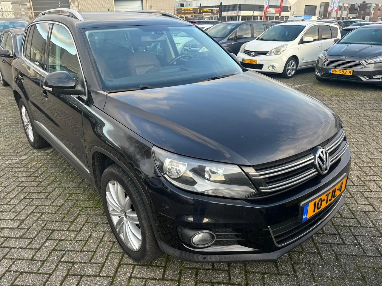 Volkswagen Tiguan - 1.4 TSI Sport&Style - AutoWereld.nl