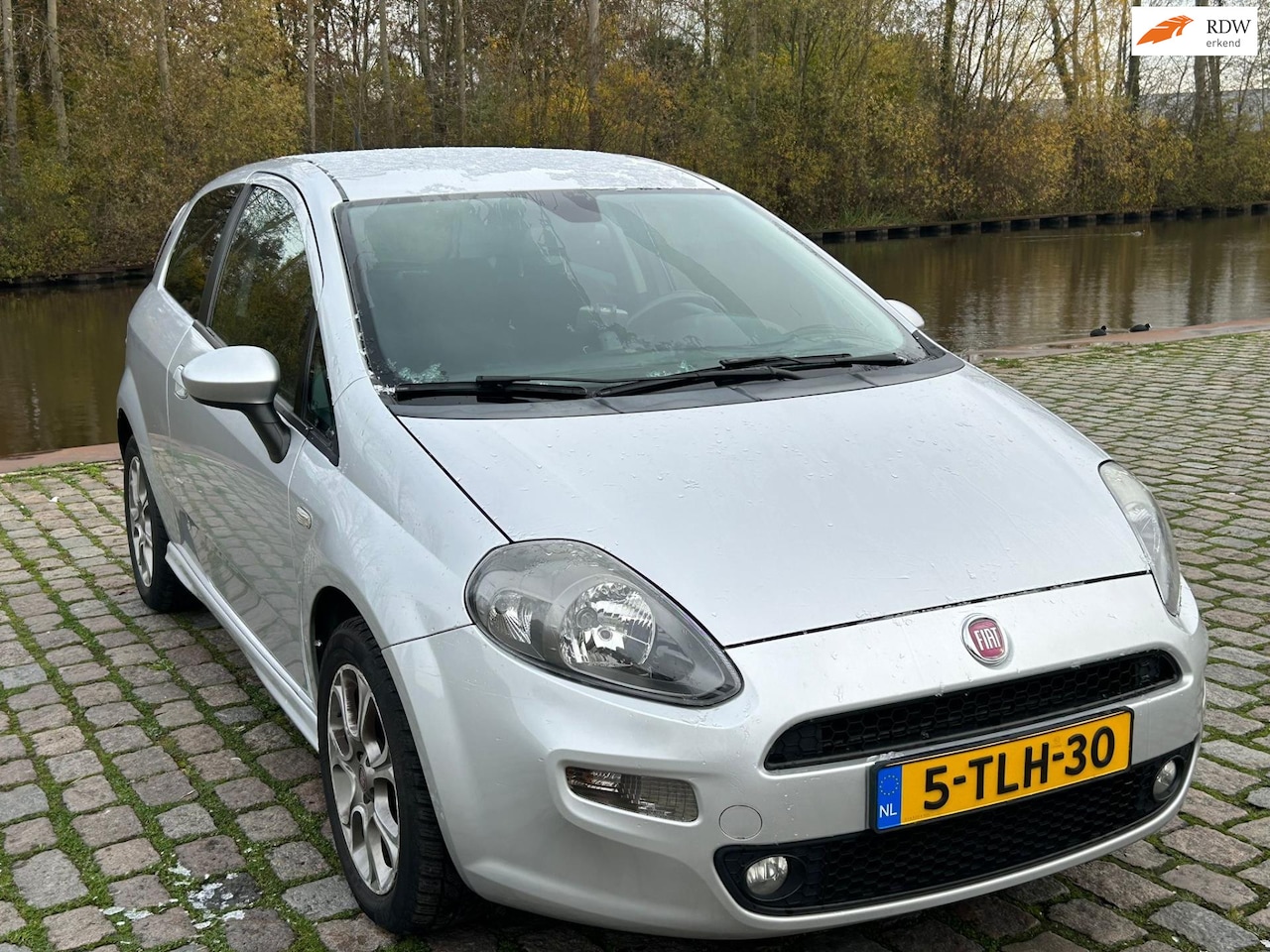 Fiat Punto Evo - 0.9 TwinAir Lounge airco elektrische ramen cv op afs - AutoWereld.nl