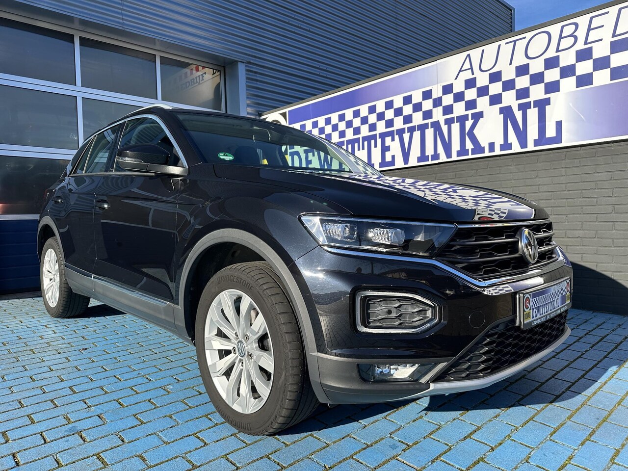 Volkswagen T-Roc - 1.5 TSI Sport ADAP CRUISE TREKH P-CAM VIRTL. APPLE - AutoWereld.nl