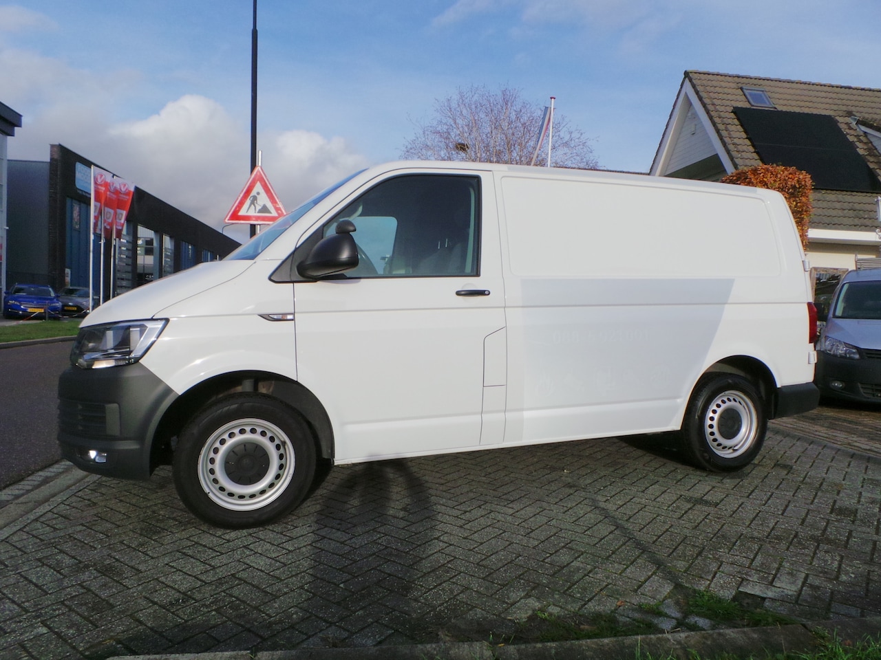 Volkswagen Transporter - 2.0 TDI 110kw/150pk L1H1 airco,cruise,navigatie,pdc,enz - AutoWereld.nl