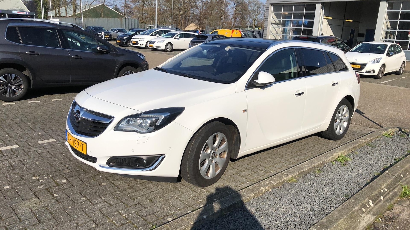 Opel Insignia Sports Tourer - 2.0 T Cosmo 4x4 1 eigenaar !  Automaat | Glazen kantel/schuifdak | Lederen interieur | PDC - AutoWereld.nl