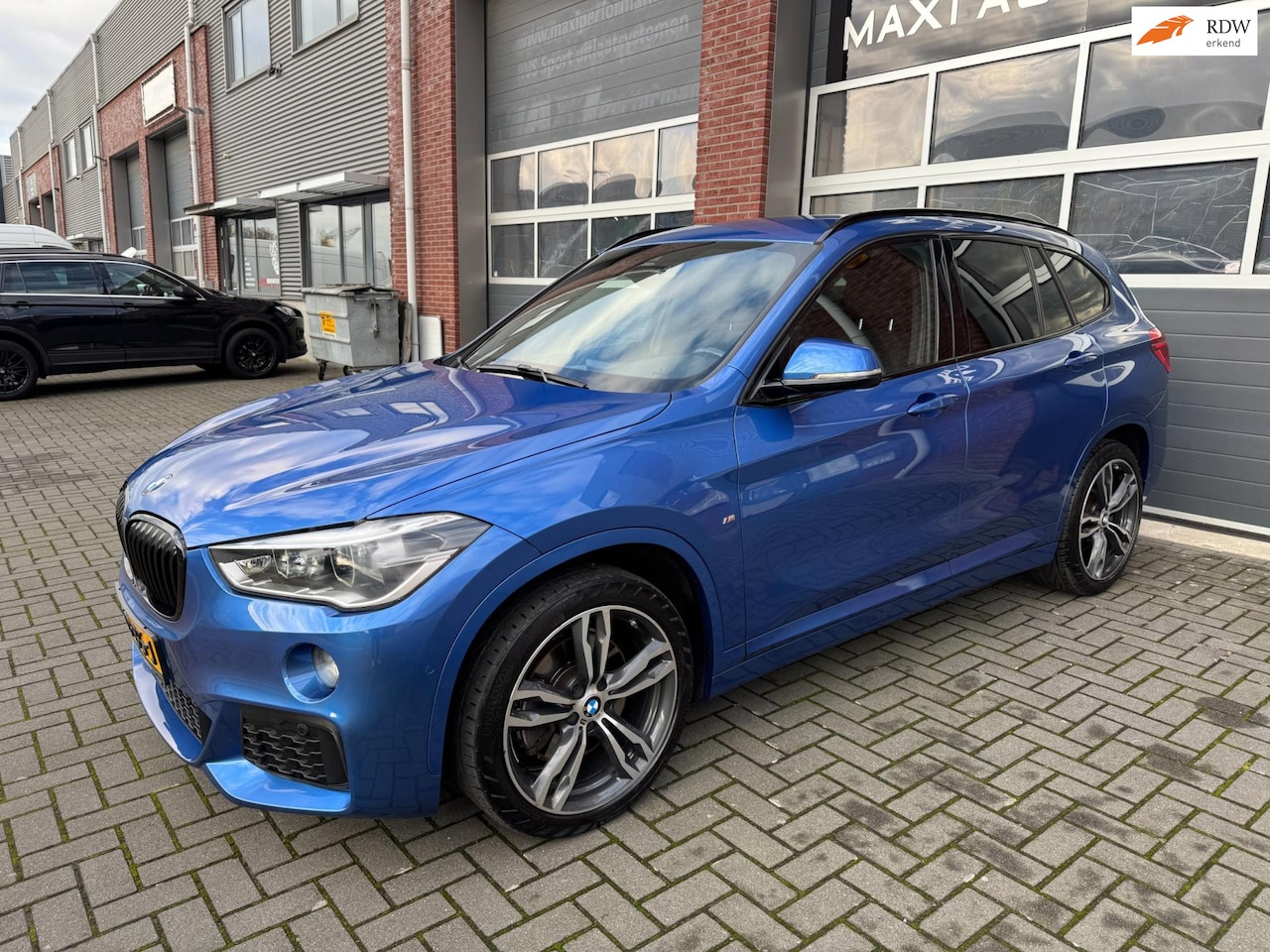 BMW X1 - XDrive20i 192PK M Sport LED HUD Navi Camera Keyless - AutoWereld.nl