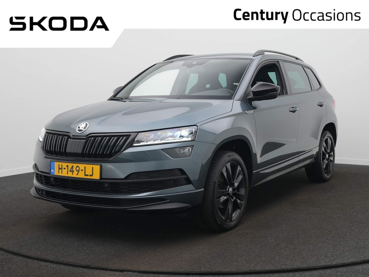 Skoda Karoq - 1.5 TSI ACT Sportline Business / Elektr. trekhaak / Dodehoek detectie / Camera - AutoWereld.nl