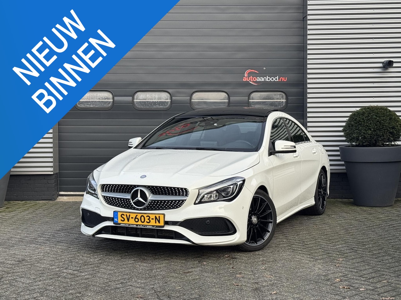 Mercedes-Benz CLA-Klasse - 180 AMG Night Edition Plus | Panoramadak | Camera | Navigatie | Cruise Control | Stoelverw - AutoWereld.nl