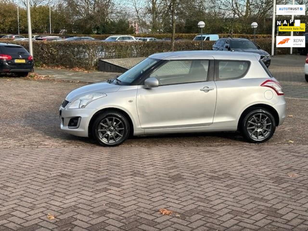 Suzuki Swift - 1.2 Bandit EASSS 1.2 Bandit EASSS,bj.2014,kleur: grijs,airco,sportvelgen,stuurbekrachtiging en APK tot 12/2 - AutoWereld.nl