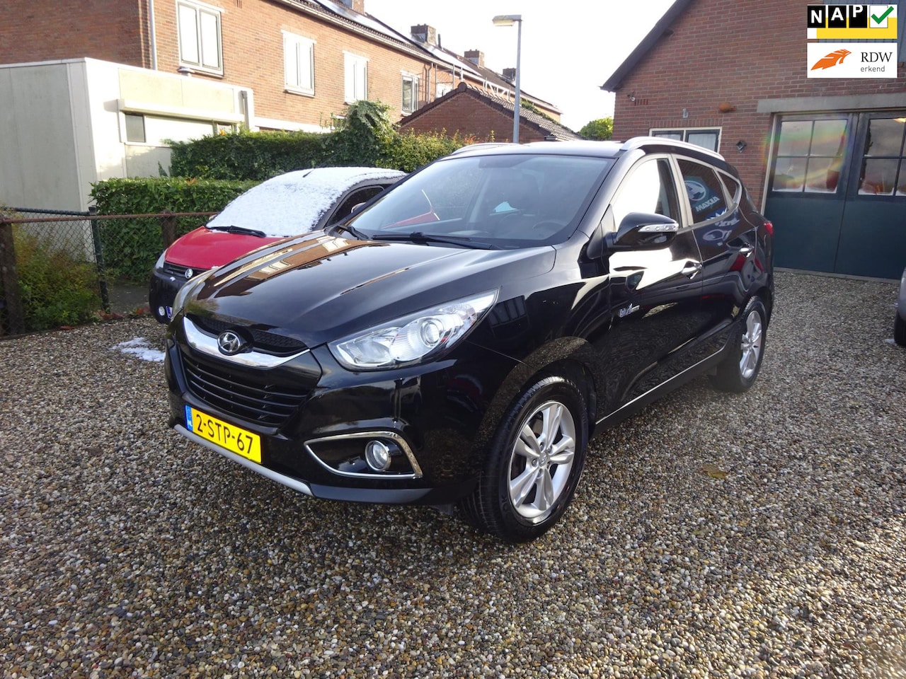 Hyundai ix35 - 1.6i GDI Pro Navigatie, Climate controle, Cruise controle, Leer, Lichtmetalen velgen, Park - AutoWereld.nl