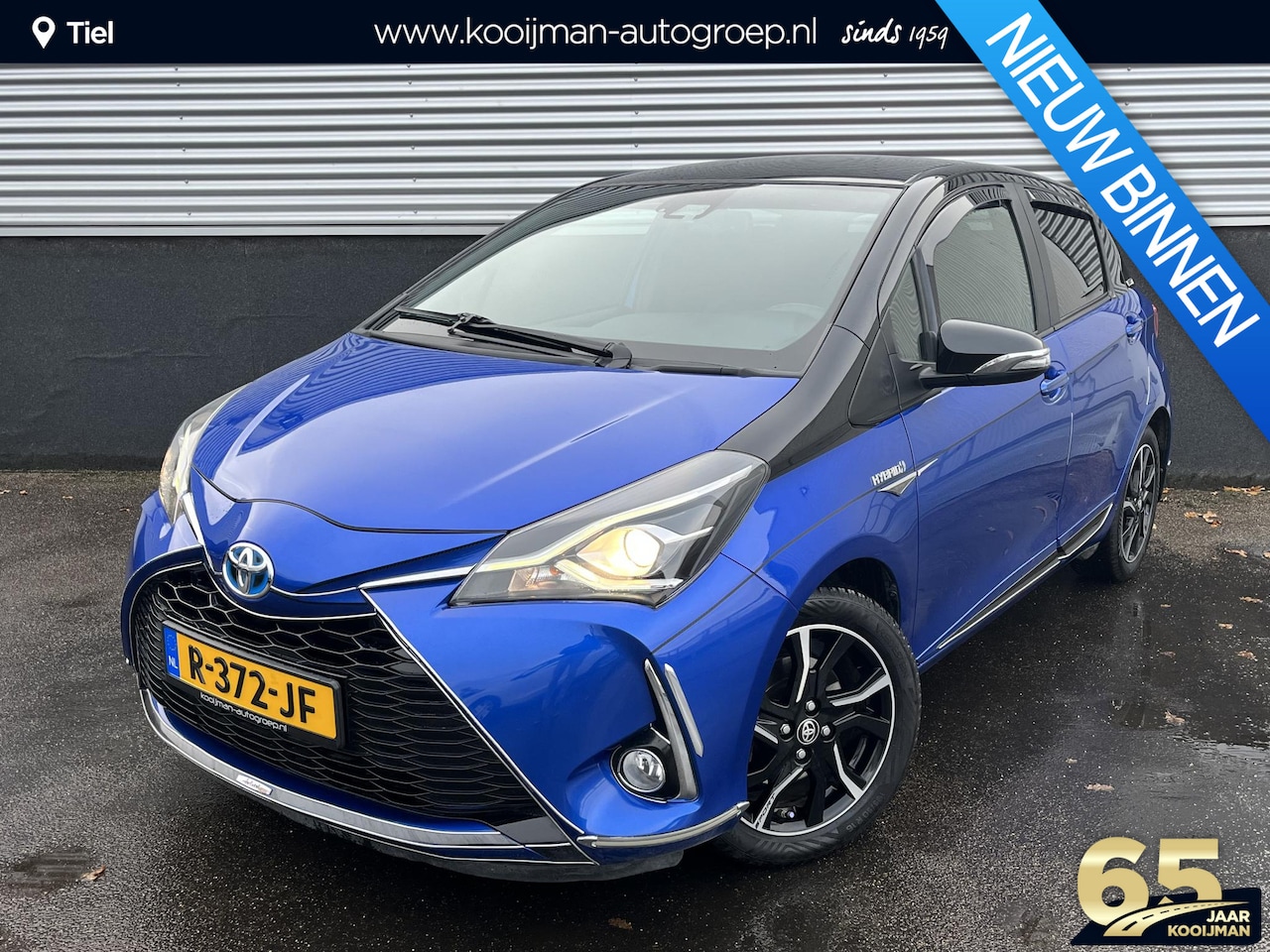 Toyota Yaris - 1.5 Hybrid Bi-Tone CVT-Automaat Navigatie, Privacy glass, Smart Key, 16" LMV, Achteruitrij - AutoWereld.nl