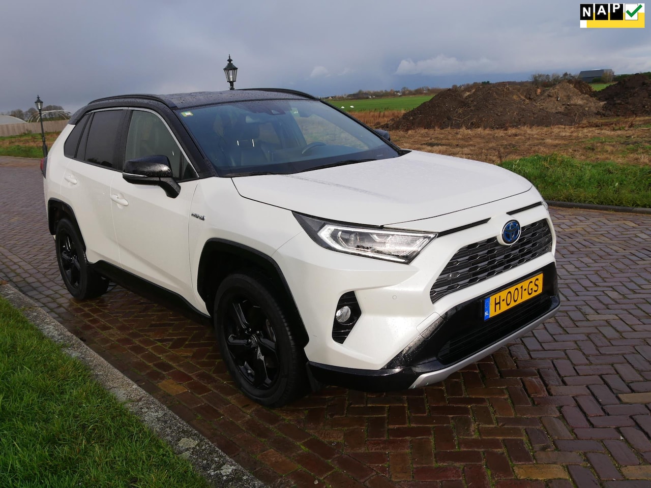 Toyota RAV4 - 2.5 Hybrid Bi-Tone JBL NAV ** 19999 NETTO ** - AutoWereld.nl