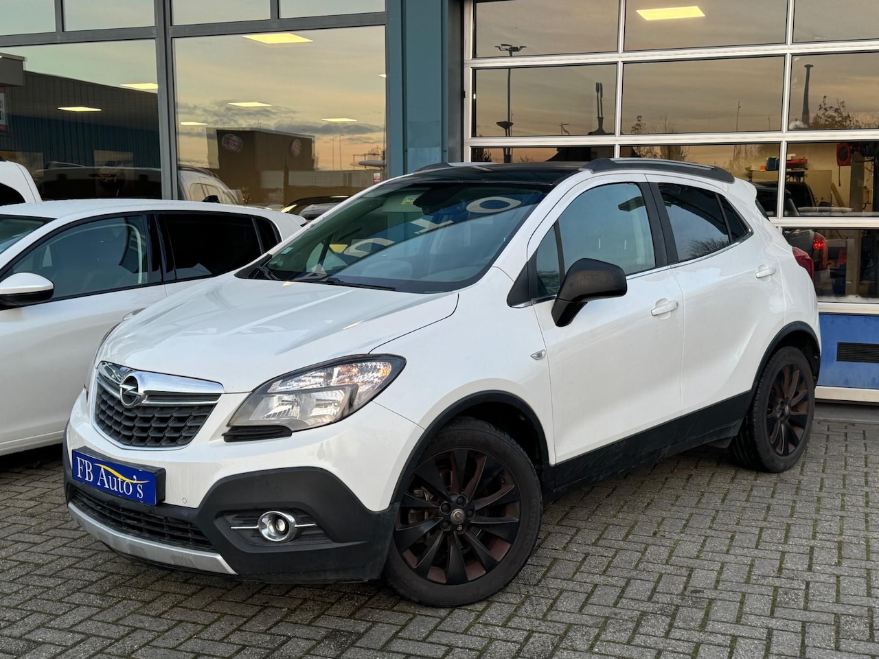 Opel Mokka - 1.4 T Cosmo Airco Lmv Navi Cruise Camera - AutoWereld.nl