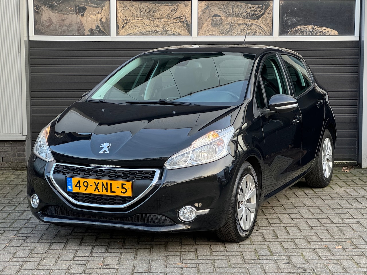 Peugeot 208 - 1.4 VTi Envy Navi, Cruise, Climate Control, NAP - AutoWereld.nl