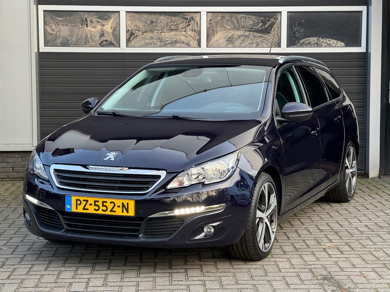 Peugeot 308 SW - 1.2 PureTech Style Navi, Cruise, Climate Control, Camera - AutoWereld.nl