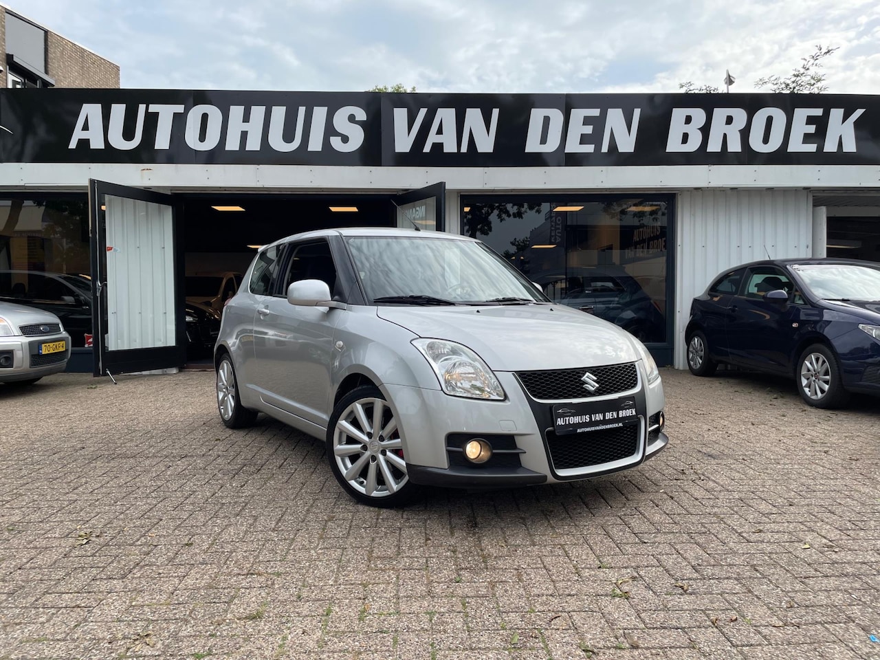 Suzuki Swift - 1.6 Sport 125Pk Airco Climate Ctr Stoelverw Elek Pakket Lm Velgen Spoiler - AutoWereld.nl