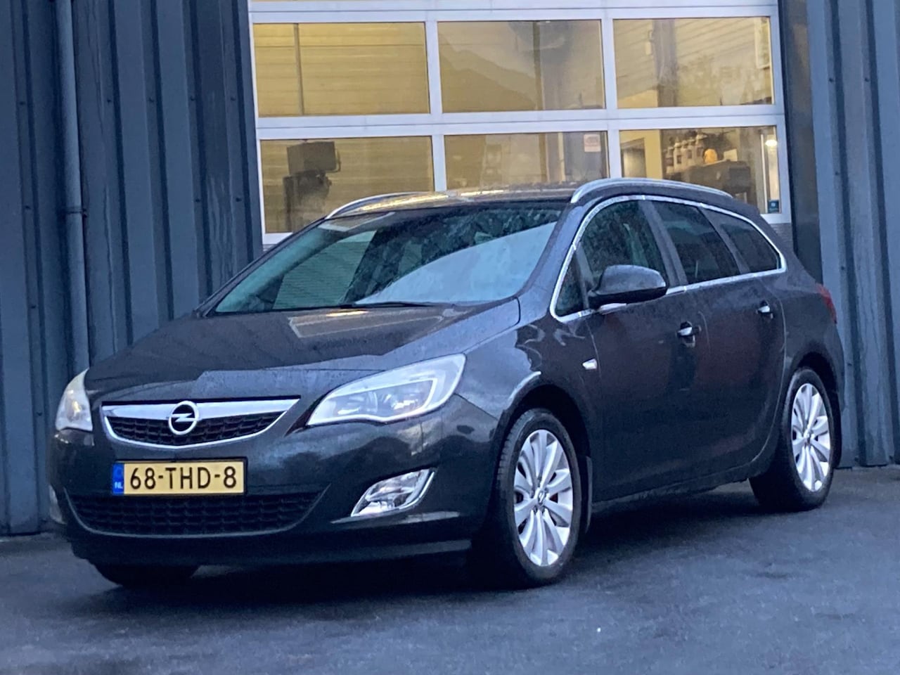 Opel Astra Sports Tourer - 1.4 Turbo Cosmo Navi Clima Cruise Trekhaak - AutoWereld.nl